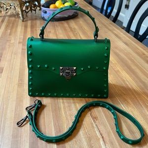 Emerald green handbag with crossbody strap. NWOT
